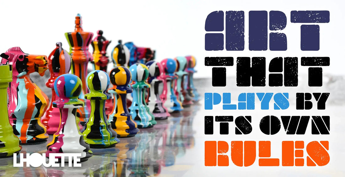 Chess Pieces painted with vibrant colours flowing down them, on top of a original art piece under a clear glass chess board. To the side is the text "Art That Plays By It's Own Rules" and in the corner is the logo for artist Lhouette.