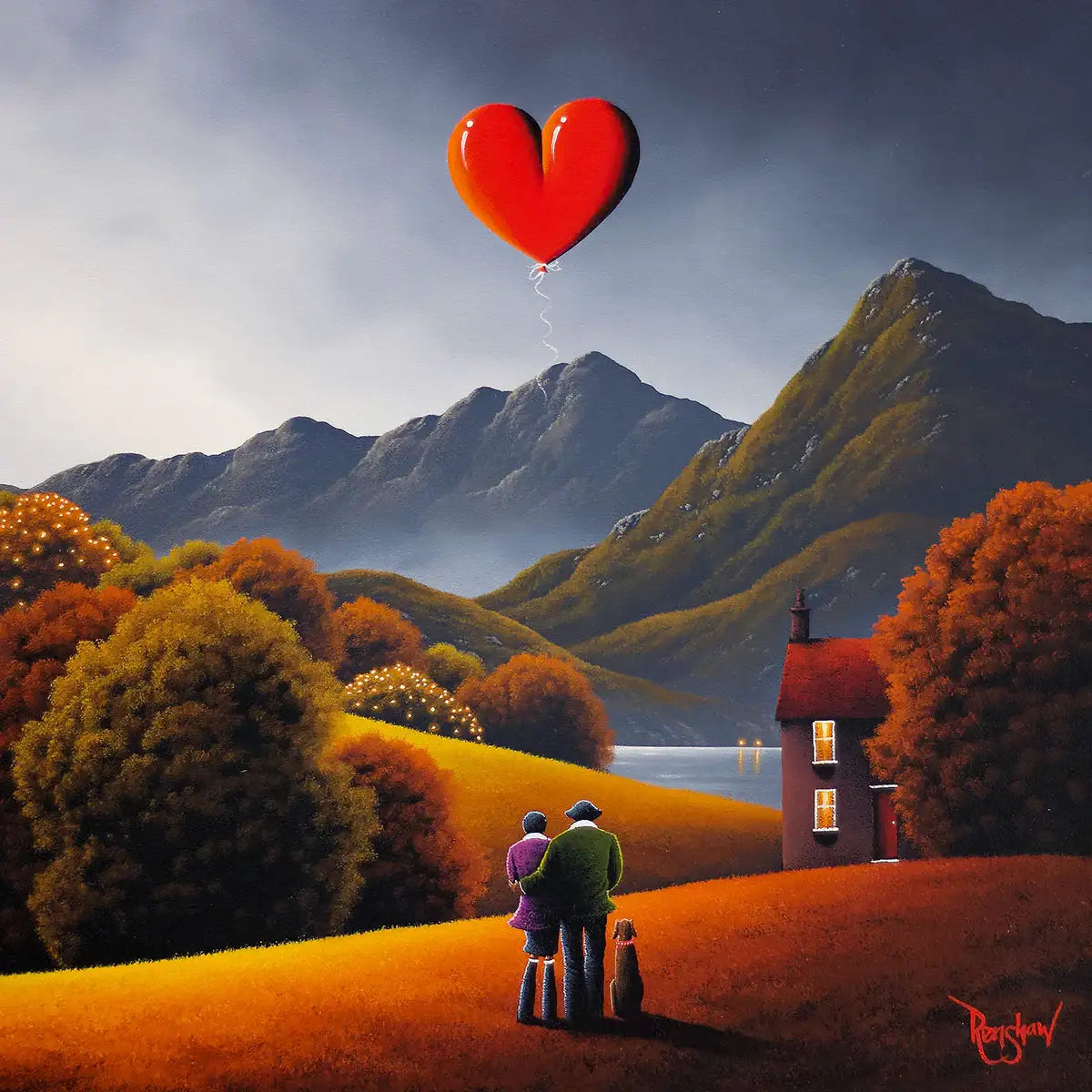 Two people standing on a hill with a red heart-shaped balloon, surrounded by mountains and trees.